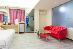 Posezení v ubytování Newrise Hotel