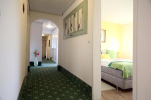 Voodi või voodid majutusasutuse Hotel-Berggasthof Schwarzwaldperle toas