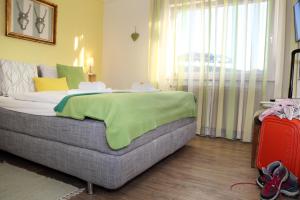 Voodi või voodid majutusasutuse Hotel-Berggasthof Schwarzwaldperle toas