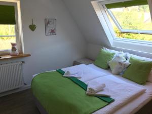 Voodi või voodid majutusasutuse Hotel-Berggasthof Schwarzwaldperle toas