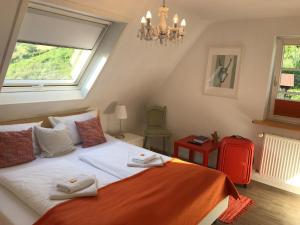 Voodi või voodid majutusasutuse Hotel-Berggasthof Schwarzwaldperle toas