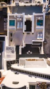 a model of a house with a boat at Iriana Suites in Fira