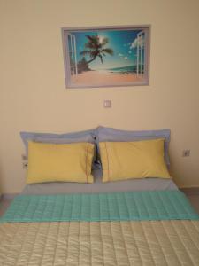 A bed or beds in a room at Demy's apartment