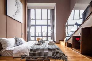 Postel nebo postele na pokoji v ubytování Lavender Apartment Branch
