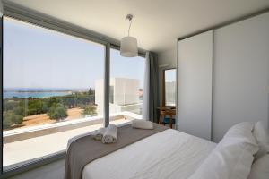 Voodi või voodid majutusasutuse Kalypso Residence toas