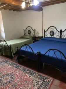 A bed or beds in a room at San Martino Vald'Afra