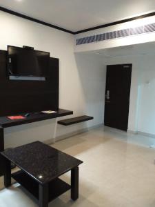 Kuchyň nebo kuchyňský kout v ubytování saravanaa residency