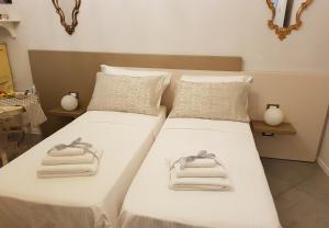 Postel nebo postele na pokoji v ubytování Il Sogno Torino Guesthouse
