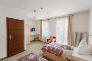 Postel nebo postele na pokoji v ubytování Gasthof Höhenrain