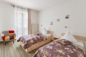 Postel nebo postele na pokoji v ubytování Gasthof Höhenrain
