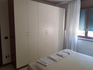 Posteľ alebo postele v izbe v ubytovaní Appartamento Diamantina