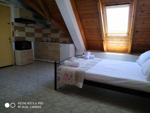 A bed or beds in a room at Apartments Onar