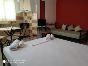 A bed or beds in a room at Apartments Onar