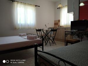 A bed or beds in a room at Apartments Onar