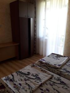 Postel nebo postele na pokoji v ubytování Guesthouse Achi