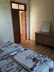 Postel nebo postele na pokoji v ubytování Guesthouse Achi