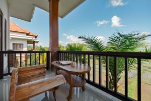 Balkón nebo terasa v ubytování Cenik Villa Ubud