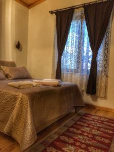 Ein Bett oder Betten in einem Zimmer der Unterkunft İpek Apart Hotel