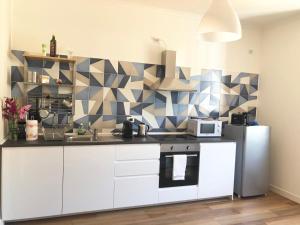 A kitchen or kitchenette at Vivi Cernobbio, la sua arte, la sua magia