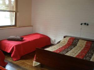 Ліжко або ліжка в номері Rannakodu