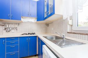 Kuchyň nebo kuchyňský kout v ubytování Apartman Justinić