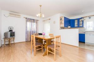 Kuchyň nebo kuchyňský kout v ubytování Apartman Justinić
