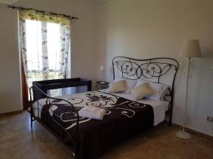 Posteľ alebo postele v izbe v ubytovaní Bed & Breakfast La Tana dei Sognatori