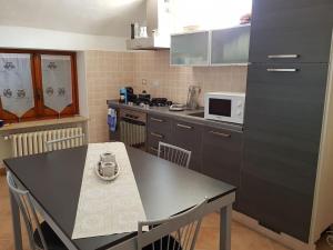 Kuchyňa alebo kuchynka v ubytovaní Bed & Breakfast La Tana dei Sognatori