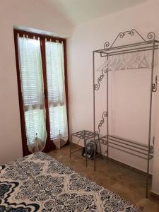 Posteľ alebo postele v izbe v ubytovaní Bed & Breakfast La Tana dei Sognatori