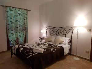 Posteľ alebo postele v izbe v ubytovaní Bed & Breakfast La Tana dei Sognatori
