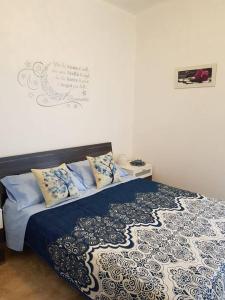 Posteľ alebo postele v izbe v ubytovaní Bed & Breakfast La Tana dei Sognatori