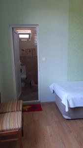 Letto o letti in una camera di Guesthouse Luka