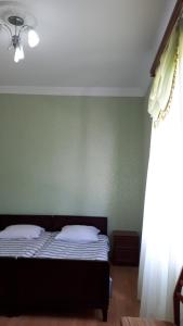 Letto o letti in una camera di Guesthouse Luka