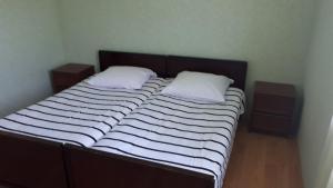 Letto o letti in una camera di Guesthouse Luka
