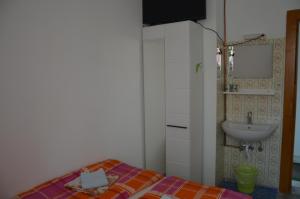Ett badrum på Pension Hrnjic
