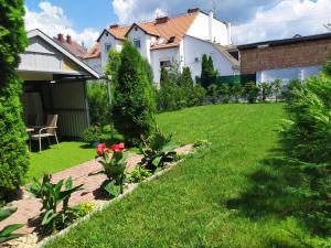 Vonkajšia záhrada v ubytovaní Silver Apartman