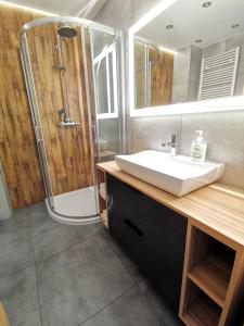 Kúpeľňa v ubytovaní Apartament Cyprys 2