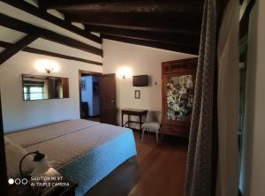 Cama o camas de una habitación en Hotel Rural Natxiondo