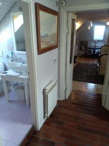 a bathroom with a sink and a mirror at KLARA Vracar in Belgrade