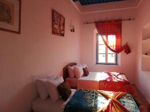 Postel nebo postele na pokoji v ubytování Appart, Hotel & Café Agadir