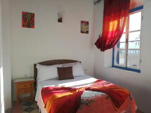 Postel nebo postele na pokoji v ubytování Appart, Hotel & Café Agadir