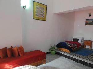 Postel nebo postele na pokoji v ubytování Appart, Hotel & Café Agadir