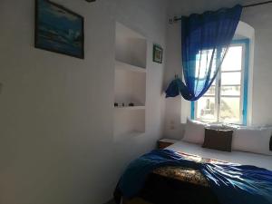 Postel nebo postele na pokoji v ubytování Appart, Hotel & Café Agadir