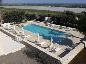 The swimming pool at or close to Masseria La Gravina