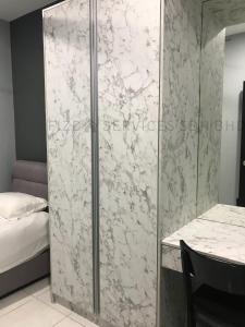 Postel nebo postele na pokoji v ubytování Cozy Apartment @ Hospital Sungai Buloh