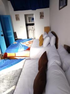Postel nebo postele na pokoji v ubytování Appart, Hotel & Café Agadir