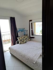 Ένα ή περισσότερα κρεβάτια σε δωμάτιο στο Apartman Marinkovic