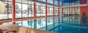Swiss Seeblick Apartment mit Hotelanbindung 내부 또는 인근 수영장