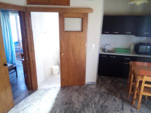 Kuchyň nebo kuchyňský kout v ubytování Summertime Apartments + 19 fotografií