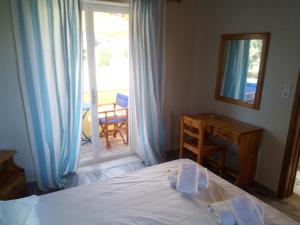 Postel nebo postele na pokoji v ubytování Summertime Apartments